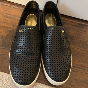 Michael Kors black leather slip on sneakers